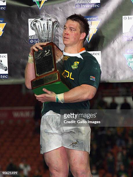 John Smit of South Africa holds the Freedom Cup after winning the Tri Nations Test between the New Zealand All Blacks and South African Springboks at...