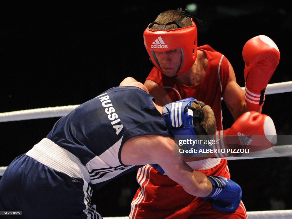 Ukrainian boxer  Vasyl Lomachenko (red)