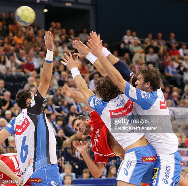 Daniel Tellander of Melsungen throws a goal during the Bundesliga Handball match between HSV Hamburg and MT Melsungen at the Colorline Arena on...