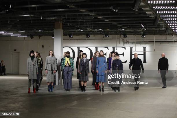 Odeeh designers Otto Droegsler and Joerg Ehrlich with models are applaued at Odeeh Defile during 'Der Berliner Salon' AW 18/19 on January 17, 2018 in...