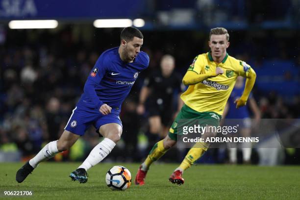 Chelsea's Belgian midfielder Eden Hazard controls the ball during the FA Cup third round replay football match between Chelsea and Norwich City at...
