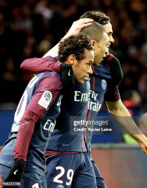 Neymar Jr of Paris Saint-Germain celebrate his goal with Edinson Cavani and Kylian Mbappe during the Ligue 1 match between Paris Saint-Germain and...