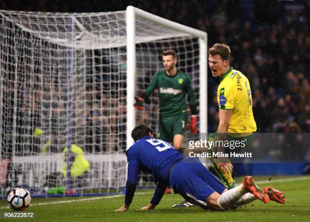 Alvaro Morata of Chelsea goes down under pressure from Christoph Zimmermann of Norwich City leading to the sending off of Alvaro Morata during The...