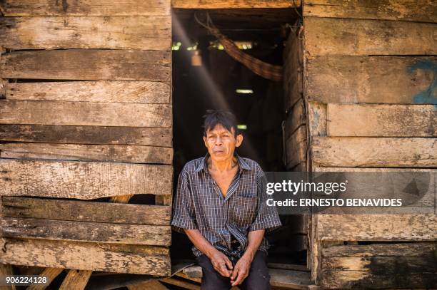 Member of the indigenous community of Palma Real, belonging to the Ese Ejja etnia, gets ready to travel to Puerto Maldonado for the visit of Pope...