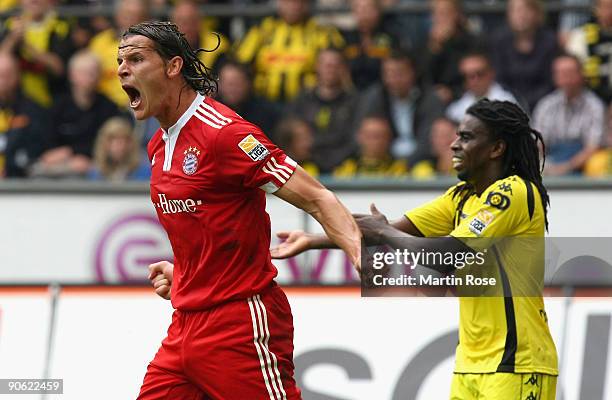 Daniel van Buyten of Bayern Munich reacts during the Bundesliga match between Borussia Dortmund and FC Bayern Muenchen at the Signal Iduna Park on...