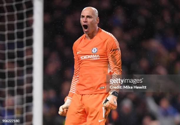 Willy Caballero of Chelsea celebrates after saving a penalty from Nelson Oliveira of Norwich City during The Emirates FA Cup Third Round Replay...