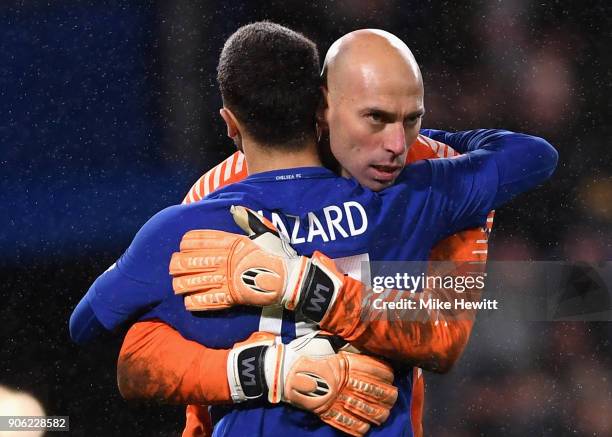 Willy Caballero of Chelsea congratlates Eden Hazard of Chelea after scoring the winning penalty during The Emirates FA Cup Third Round Replay between...