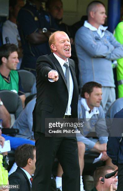 Gary Megson manager of Bolton Wanderers shouts instructions to his players during the Barclays Premier League match between Portsmouth and Bolton...