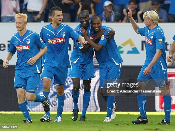 Marvin Compper of Hoffenheim celebrates after scoring his team's third goal with his team mates Demba Ba , Andreas Beck , Vedad Ibisevic and Andreas...