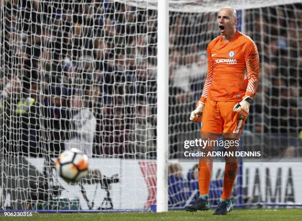 Chelsea's Argentinian goalkeeper Willy Caballero saves the penalty from Norwich City's Portuguese striker Nelson Oliveira during the FA Cup third...