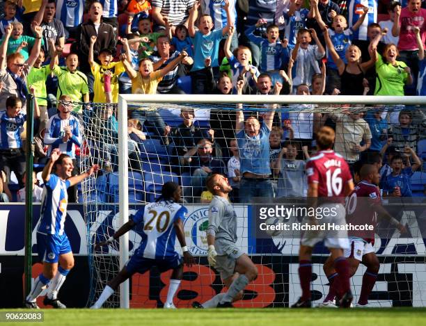 Hugo Rodallega of Wigan scores during the Barclays Premier League match between Wigan Athletic and West Ham United at the DW Stadium on September 12,...