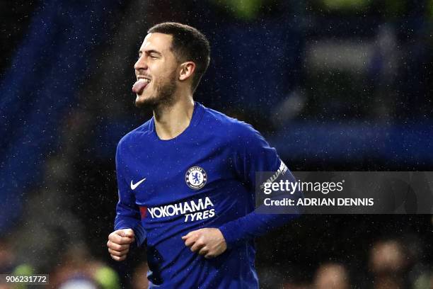 Chelsea's Belgian midfielder Eden Hazard reacts to scoring the winning penalty during the FA Cup third round replay football match between Chelsea...