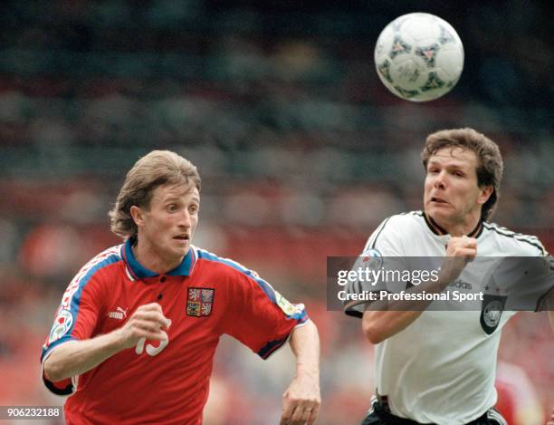 Michal Hornak of the Czech Republic and Andreas Moller of Germany battle for possession during the UEFA Euro96 Group C football match at Old Trafford...