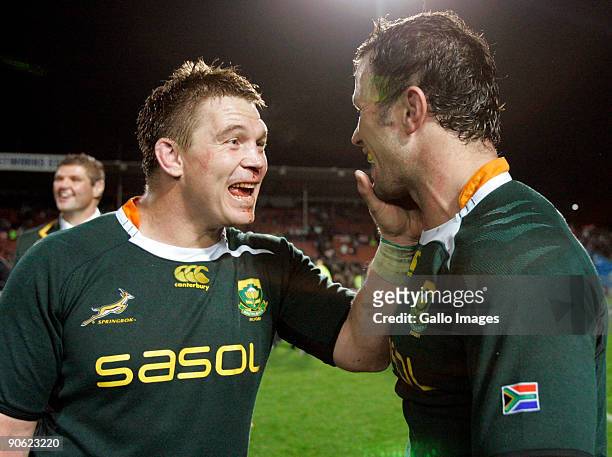 John Smit and Bismarck du Plessis of South Africa celebrate after winning the Tri Nations Test between the New Zealand All Blacks and South Africa...