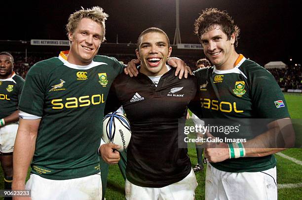 Jean de Villiers, Bryan Habana and Jaque Fourie of South Africa celebrates after winning the Tri Nations Test between the New Zealand All Blacks and...