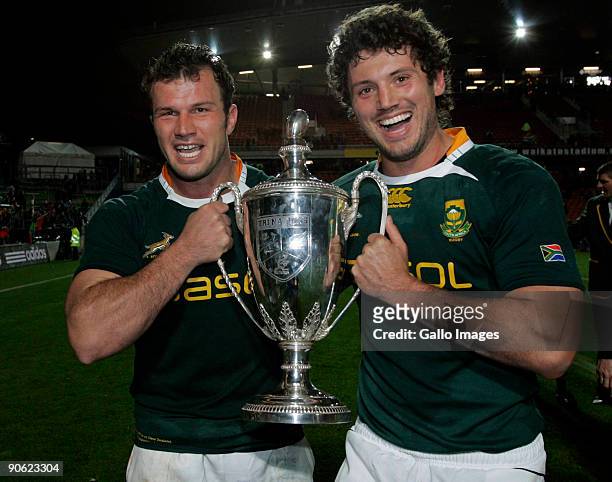 Bismarck du Plessis and Ryan Kankowski of South Africa celebrate after winning the Tri Nations Test between the New Zealand All Blacks and South...