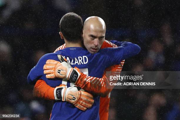 Chelsea's Belgian midfielder Eden Hazard celebrates victory with Chelsea's Argentinian goalkeeper Willy Caballero during the FA Cup third round...