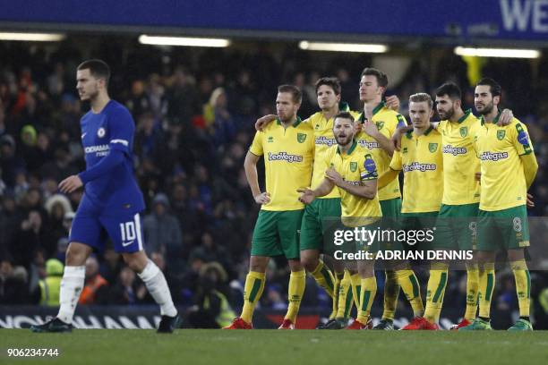 Chelsea's Belgian midfielder Eden Hazard walks to take his penalty during the FA Cup third round replay football match between Chelsea and Norwich...