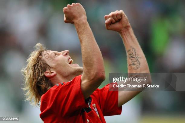 Stefan Kiessling of Leverkusen jubilates after the Bundesliga match between VfL Wolfsburg and Bayer Leverkusen at Volkswagen Arena on September 12,...