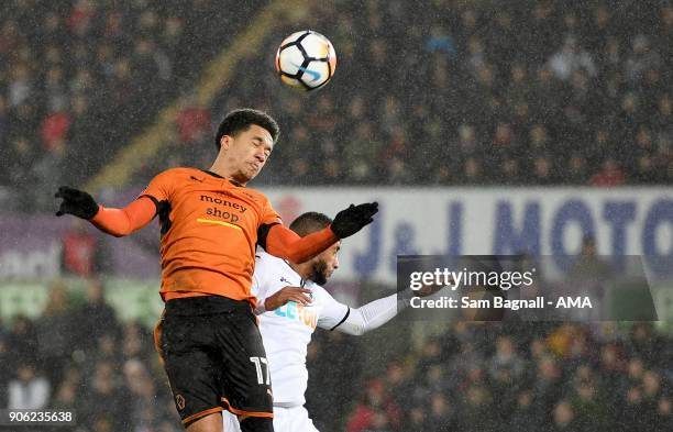 Helder Costa of Wolverhampton Wanderers and Luciano Narsingh of Swansea City during The Emirates FA Cup Third Round Replay between Swansea City and...