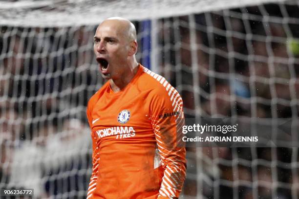 Chelsea's Argentinian goalkeeper Willy Caballero saves the penalty from Norwich City's Portuguese striker Nelson Oliveira during the FA Cup third...