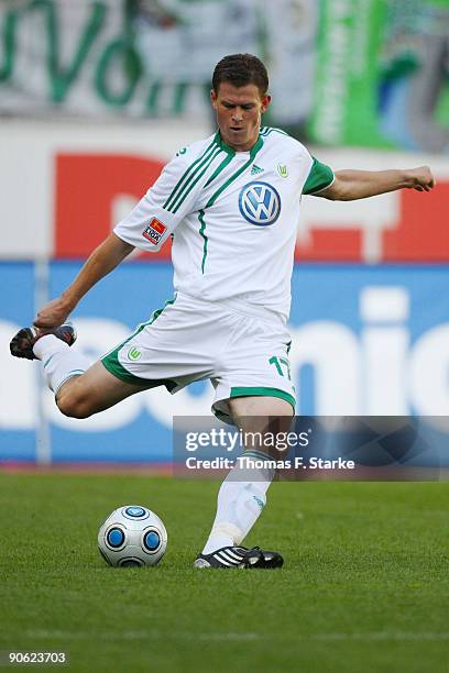 Alexander Madlung of Wolfsburg runs with the ball during the Bundesliga match between VfL Wolfsburg and Bayer Leverkusen at Volkswagen Arena on...