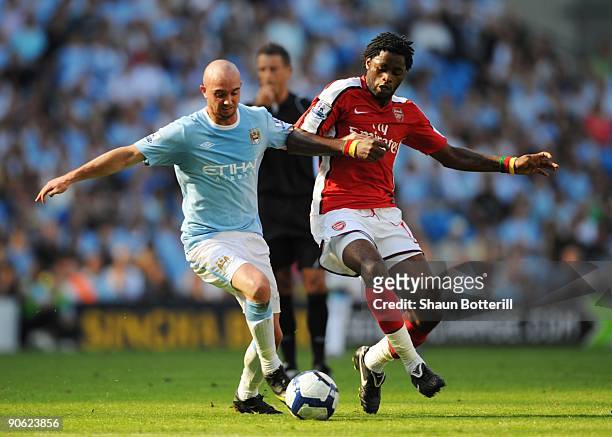 Stephen Ireland of Manchester City battles for the ball with Alexandre Song of Arsenal during the Barclays Premier League match between Manchester...