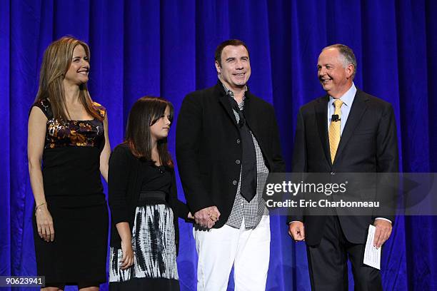 Kelly Preston, Ella Bleu Travolta, John Travolta and Disney's Dick Cook at Walt Disney Pictures Presentation at Disney's D23 Expo on September 11,...