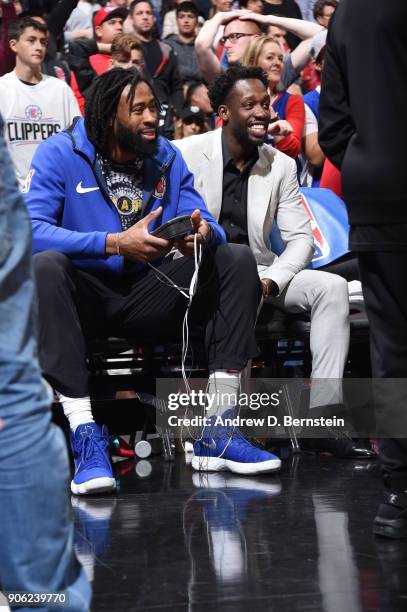 DeAndre Jordan and Patrick Beverley of the LA Clippers look on during the game against the Houston Rockets on January 15, 2018 at STAPLES Center in...