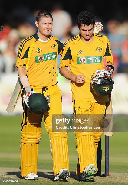 Michael Clarke of Australia walks off with Callum Ferguson after Australia defeated England during the 4th NatWest One Day International between...