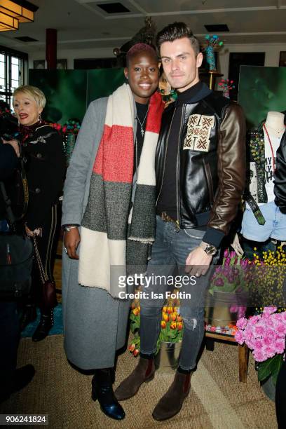 Model Aminata Sanogo and model and blogger Paul-Henry Duval attend the Thomas Sabo Press Cocktail during the Mercedes-Benz Fashion Week Berlin A/W...
