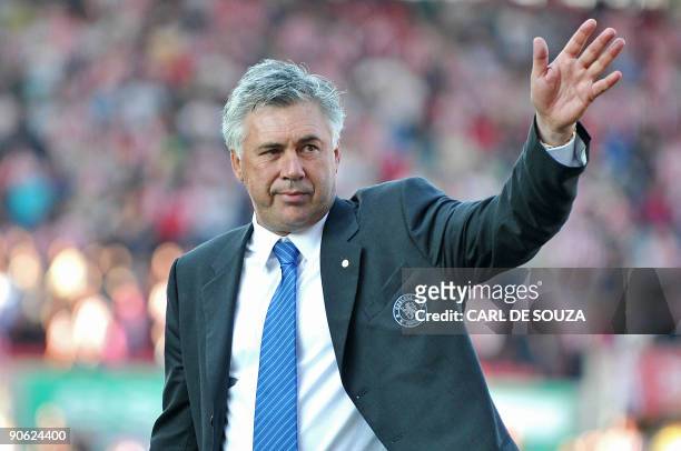 Chelsea's Italian manager Carlo Ancelotti waves to fans after the English Premier League football match between Stoke City and Chelsea at the...
