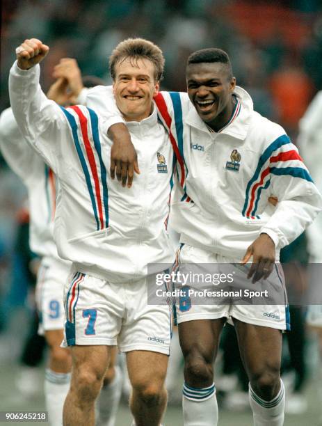 Didier Deschamps and Marcel Desailly of France celebrate victory against the Netherlands following a UEFA Euro96 quarter-final match at Anfield in...