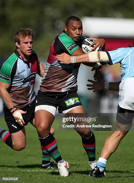 Jordan Turner-Hall of Harlequins takes on the Leicester defence during the Guinness Premiership match between Harlequins and Leicester Tigers at the...