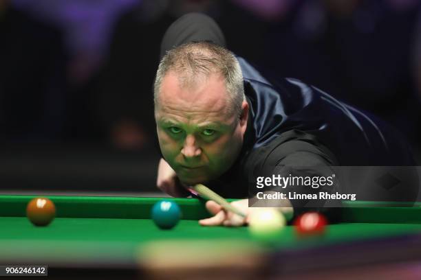 John Higgins of Scotland in action during his first round match against Anthony McGill of Scotland on day four of The Dafabet Masters at Alexandra...