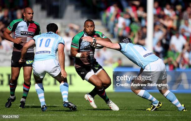 Jordan Turner-Hall of Harlequins takes on the Leicester defence during the Guinness Premiership match between Harlequins and Leicester Tigers at the...