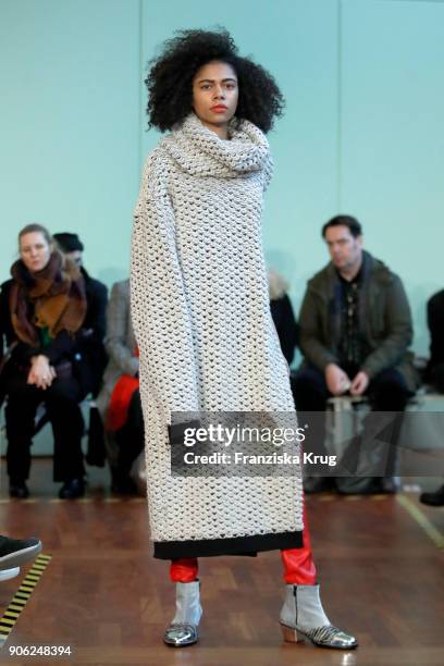 Model walks the runway during the Rebekka Ruetz Fashion Show at Embassy of Austria on January 16, 2018 in Berlin, Germany.