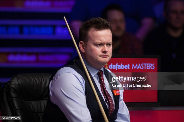 Shaun Murphy of England reacts during his first round match against Ali Carter of England on day four of The Dafabet Masters at Alexandra Palace on...