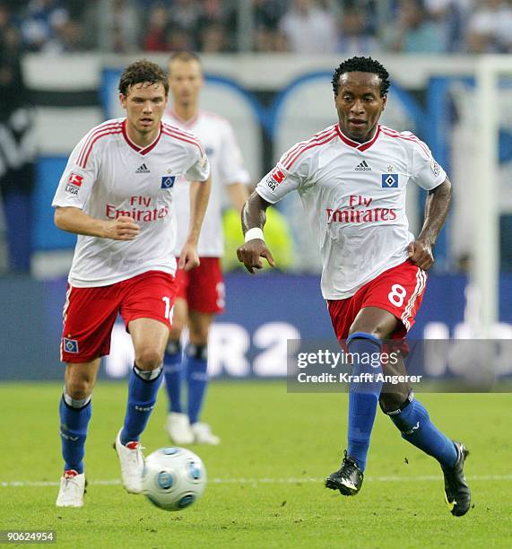 Ze Roberto of Hamburg runs with the ball during the Bundesliga match between Hamburger SV and VfB Stuttgart at HSH Nordbank Arena on September 12,...