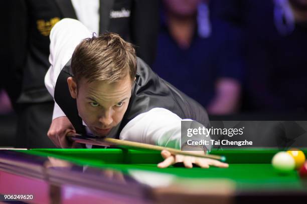 Ali Carter of England plays a shot during his first round match against Shaun Murphy of England on day four of The Dafabet Masters at Alexandra...