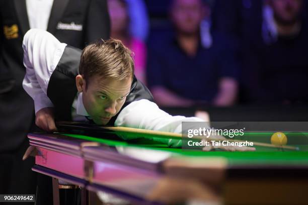 Ali Carter of England plays a shot during his first round match against Shaun Murphy of England on day four of The Dafabet Masters at Alexandra...