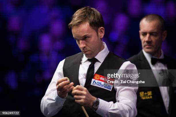 Ali Carter of England reacts during his first round match against Shaun Murphy of England on day four of The Dafabet Masters at Alexandra Palace on...