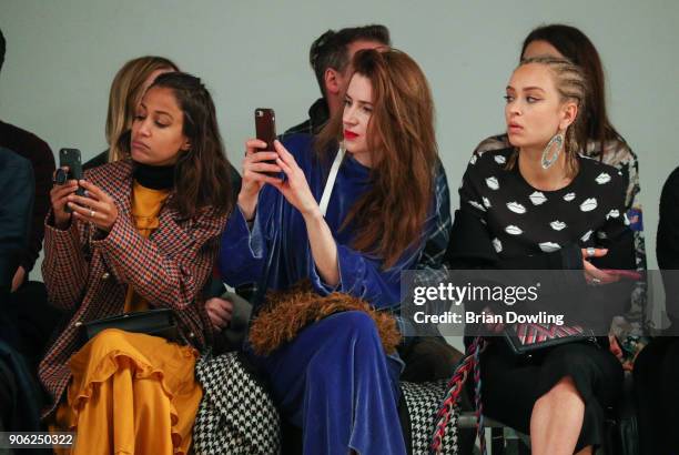 Rabea Schif, Julia Malik, and Caro Cult attend Odeeh Defile during 'Der Berliner Salon' AW 18/19 on January 17, 2018 in Berlin, Germany.