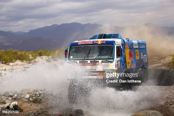 Dmitry Sotnikov of Russia and Team KAMAZ Master drives with co-driver Ruslan Akhmadeev of Russia and mechanic Ilnur Mustafin of Russia in a 43509...