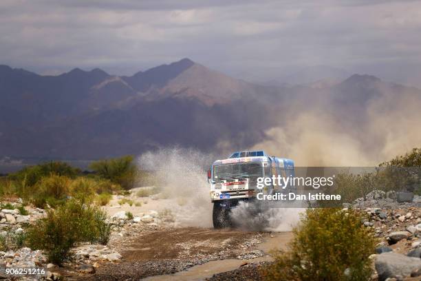 Dmitry Sotnikov of Russia and Team KAMAZ Master drives with co-driver Ruslan Akhmadeev of Russia and mechanic Ilnur Mustafin of Russia in a 43509...