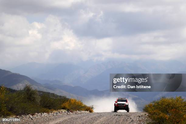 Giniel De Villiers of South Africa and Toyota Gazoo Racing drives with co-driver Dirk Von Zitzewitz of Germany in the Hilux Toyota car in the Classe...