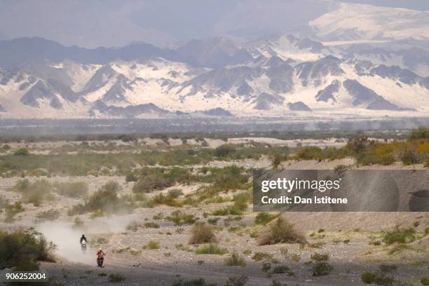 Patrice Carillon of France rides a KTM 450 Rally bike in the Classe 2.2 : Marathon next to Philippe Cavelius of France and KTM rides a 450 Rally...