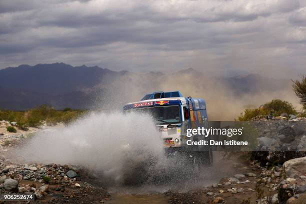 Dmitry Sotnikov of Russia and Team KAMAZ Master drives with co-driver Ruslan Akhmadeev of Russia and mechanic Ilnur Mustafin of Russia in a 43509...