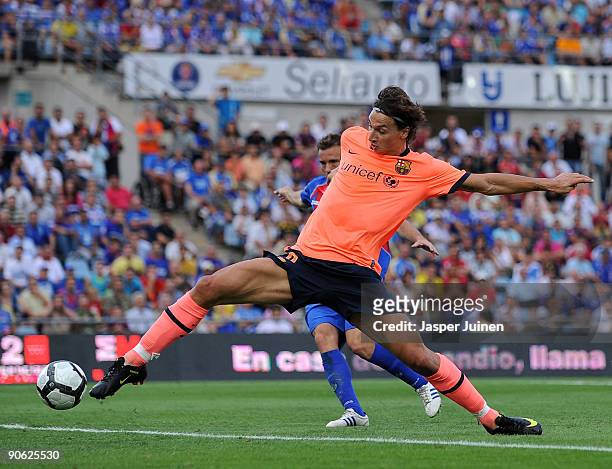 Zlatan Ibrahimovic of Barcelona scores his sides opening goal during the La Liga match between Getafe and Real Madrid at the Coliseum Alfonso Perez...