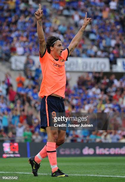 Zlatan Ibrahimovic of Barcelona celebrates scoring his sides opening goal during the La Liga match between Getafe and Real Madrid at the Coliseum...